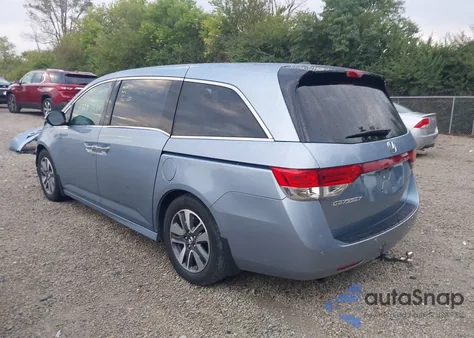 2014 Honda Odyssey Touring/Touring Elite z USA, uszkodzony, nr VIN 5FNRL5H95EB070892